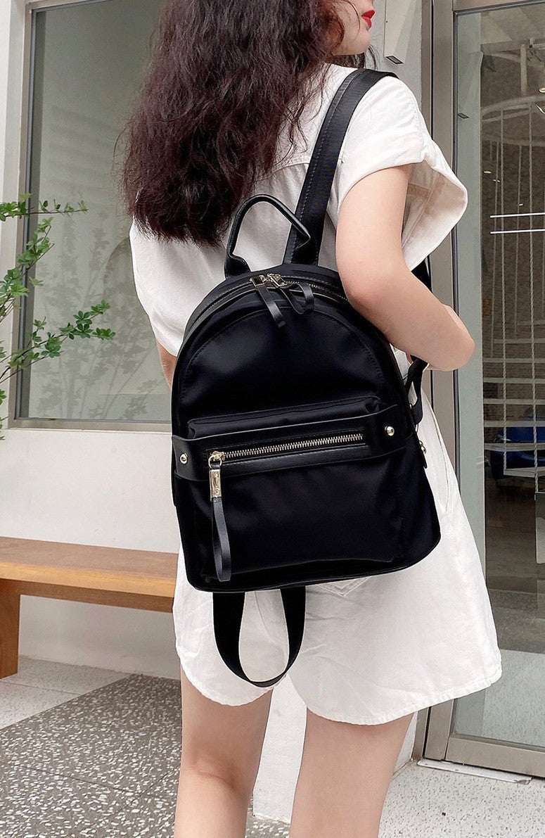 stylish nylon and leather trim backpack