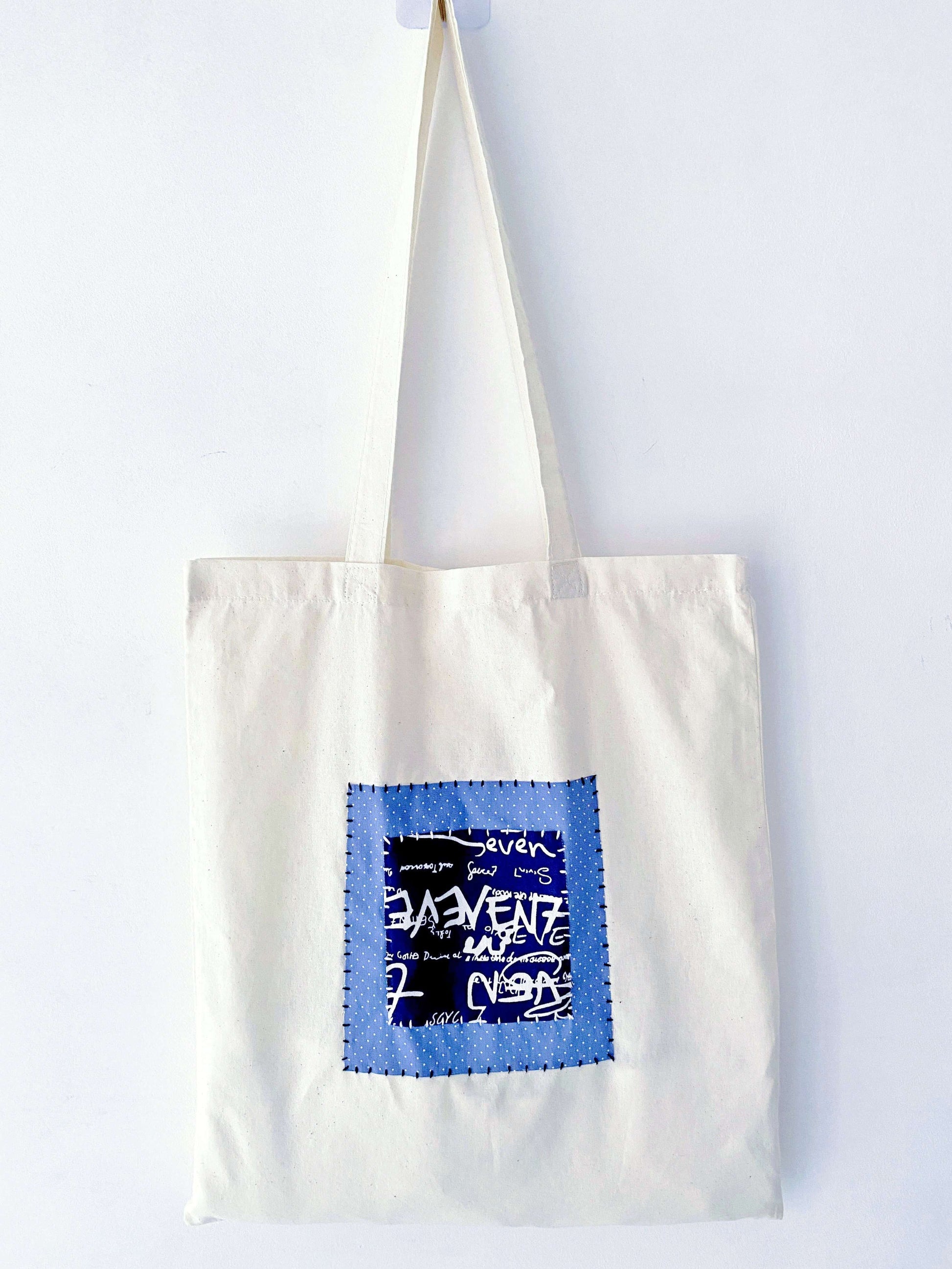 Soft eco cotton tote with handmade patchwork accents, chosen for its relaxed look and everyday practicality