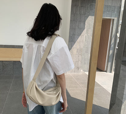 Slouchy wide shoulder bag matching relaxed oversized casual clothing