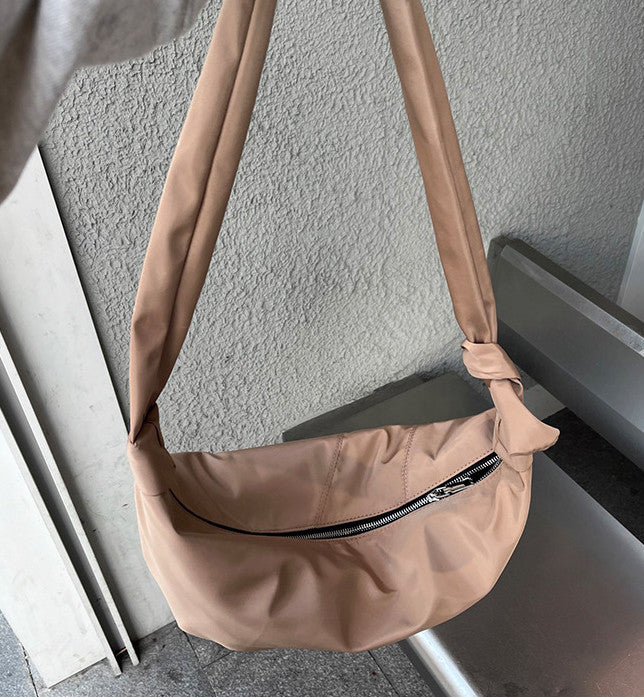 Water-ready shoulder pack for unpredictable weather
