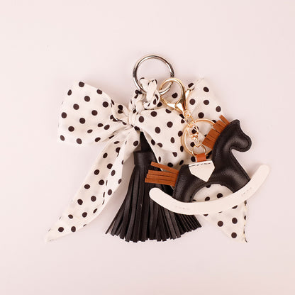 Cute bow tie handbag accessory captured in bright natural morning light