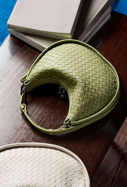 versatile leather crescent handbag