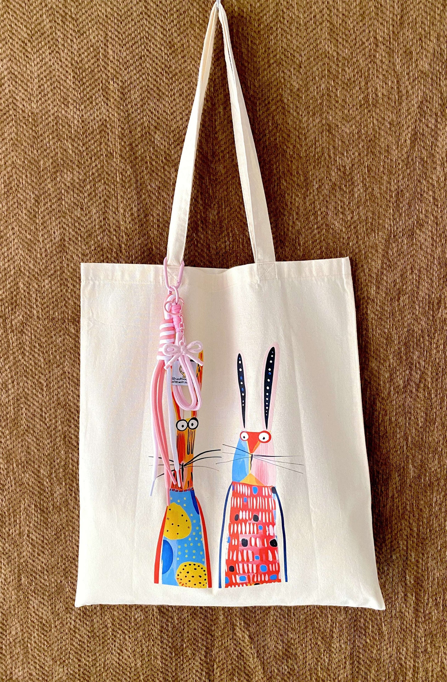 Soft cotton fabric bag draped over a shoulder with a visible thin texture.