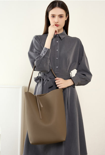 Designer genuine leather bucket bag with soft material, suitable for everyday use