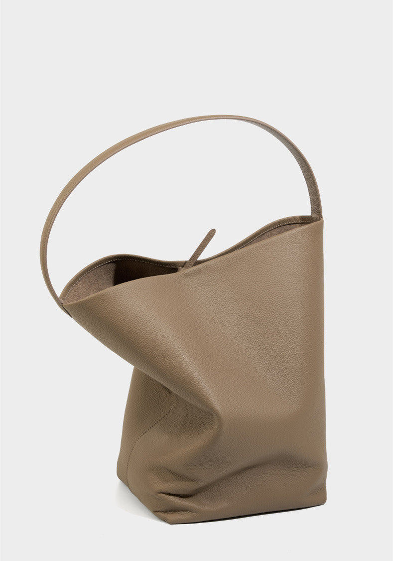 Trendy soft leather bucket bag with slouchy style for women