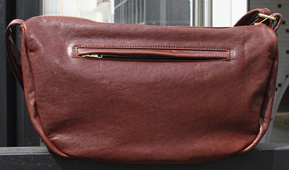 Whimsical Leather Messenger Bag with Boho Vibes