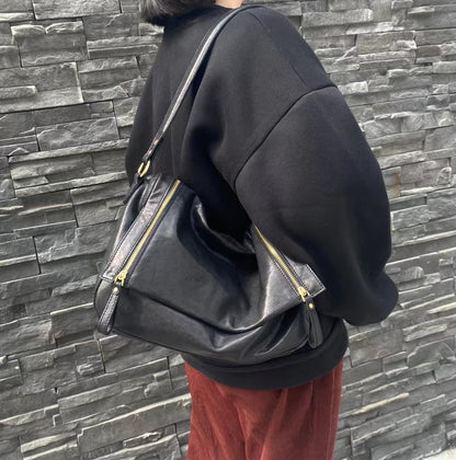 Versatile Leather Tote Bag with Unique Zipper Design