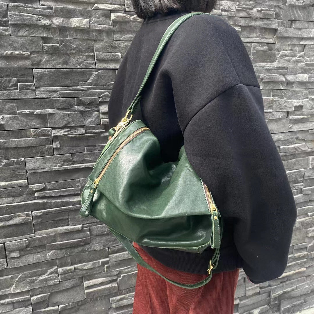 Distinctive Leather Crossbody Bag with Unique Zipper Mechanism