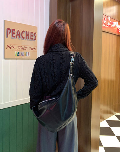 Women's crossbody bag with spacious interior for shopping