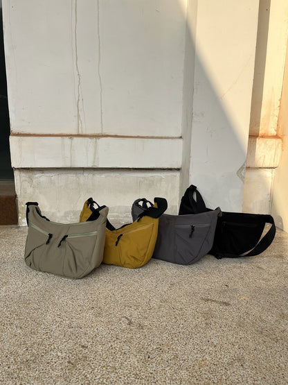 Soft sling purse for walking around town