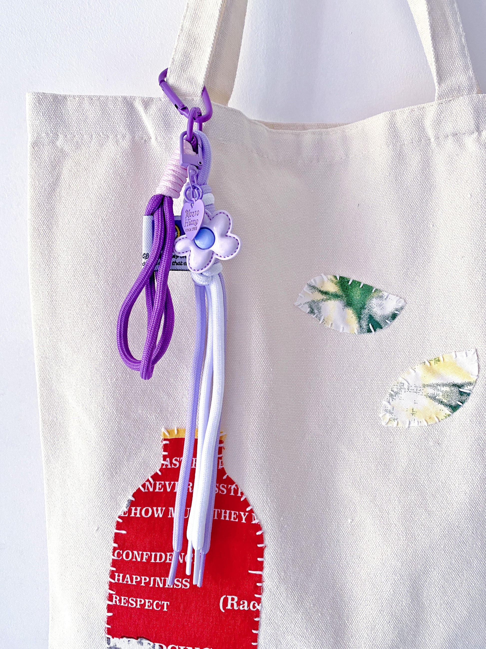Artistic patchwork canvas tote leaning into the soft minimal fashion trend.