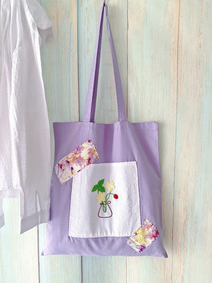 Handmade embroidered tote to celebrate a first apartment