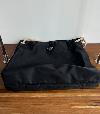 Large tote for books, bottles, and everyday essentials