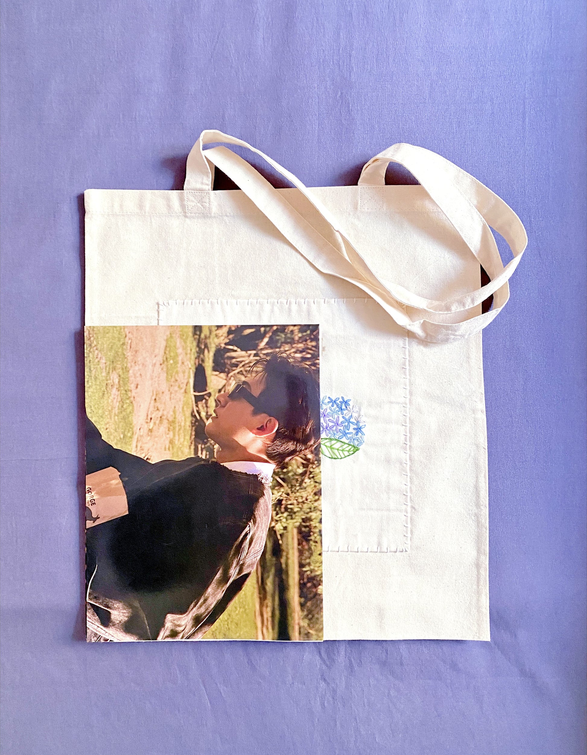 A thoughtful end-of-year gift for teachers, spacious enough for papers and adorned with lovely hand-embroidered botanical motifs.