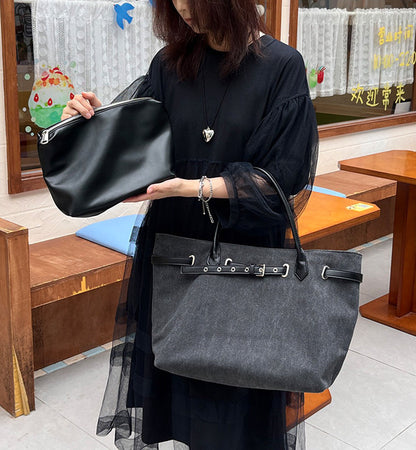 Neutral canvas tote bag used for daily shopping trips