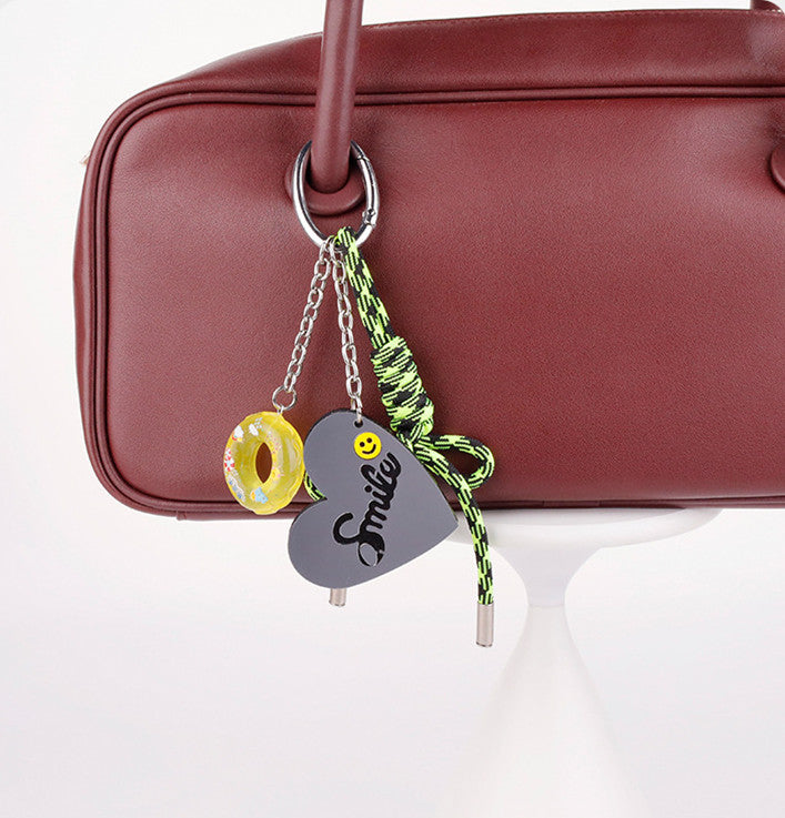 Green keychain charm with a sporty casual look