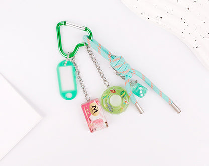 Handmade green charm attached to a canvas tote