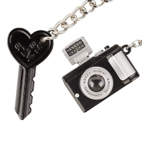 Compact tassel charm for backpacks and travel bags