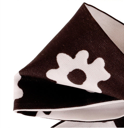 Black silk bow purse charm shown as a aesthetic holiday gift for her