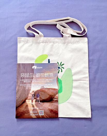 Versatile cream colored tote paired with a linen summer outfit