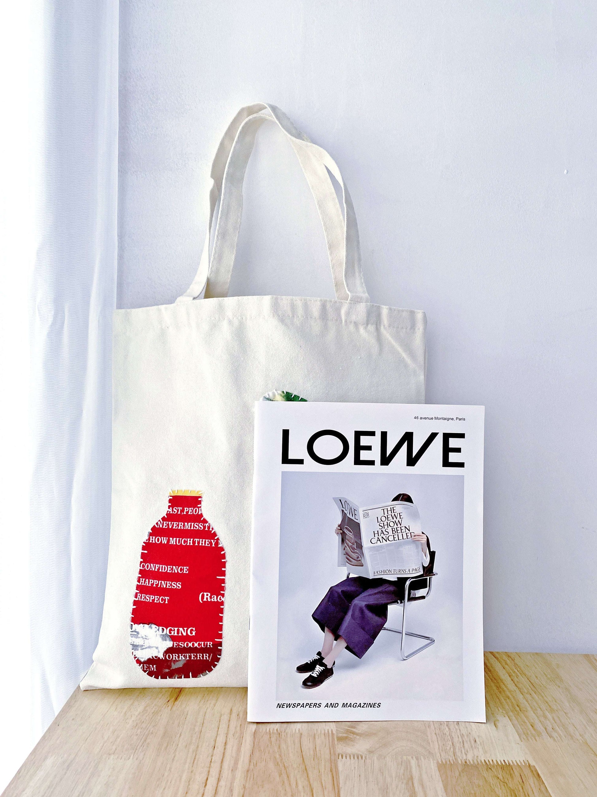 Sustainable canvas tote with hand-stitched patchwork, ideal for conscious shoppers looking for durability and style.