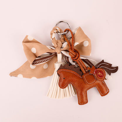 Handmade scarf bow decoration for a tote or backpack