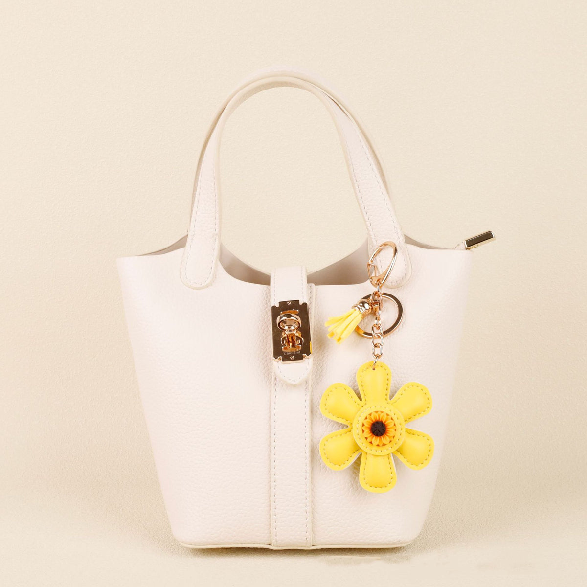 Sunflower flower charm with a soft decorative tassel