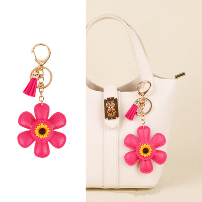 Sunflower tassel charm for refreshing an everyday tote