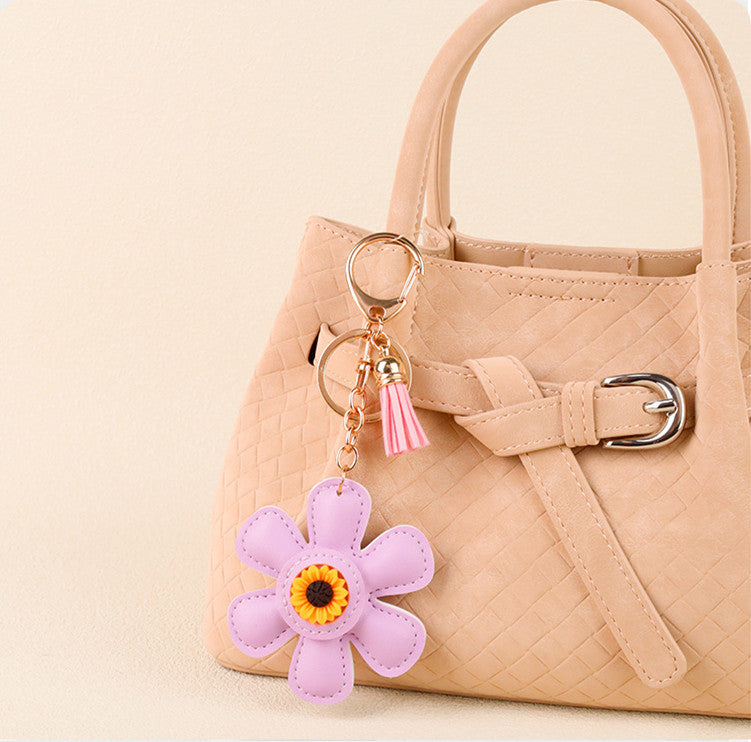 Yellow sunflower tassel detail on a casual tote bag