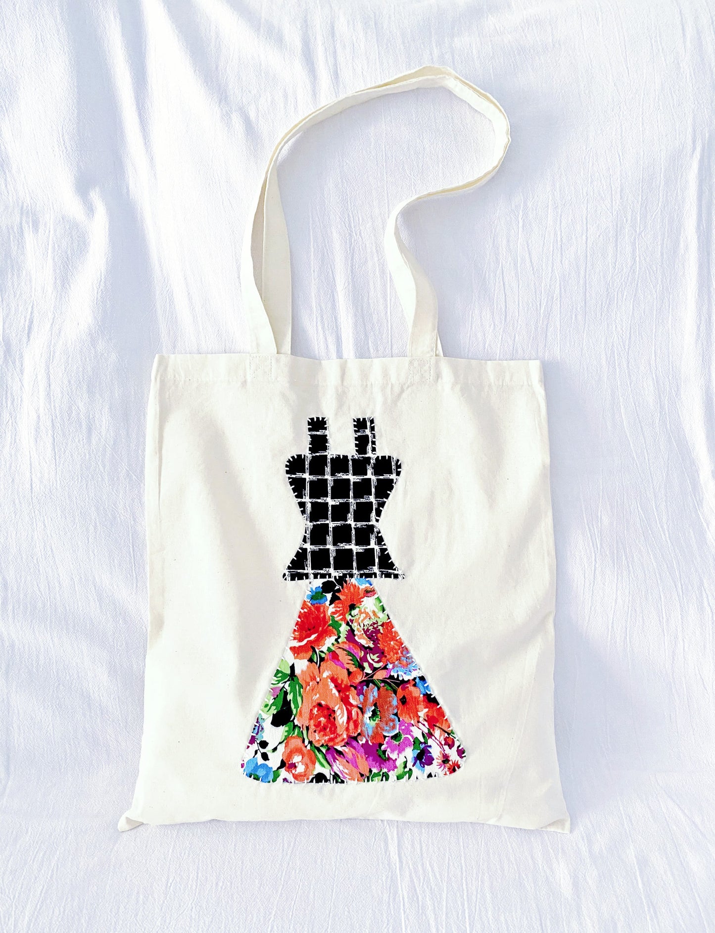 A cotton tote with stitched patchwork that feels gentle on the shoulder and quietly aligns with eco-minded, low-waste daily habits