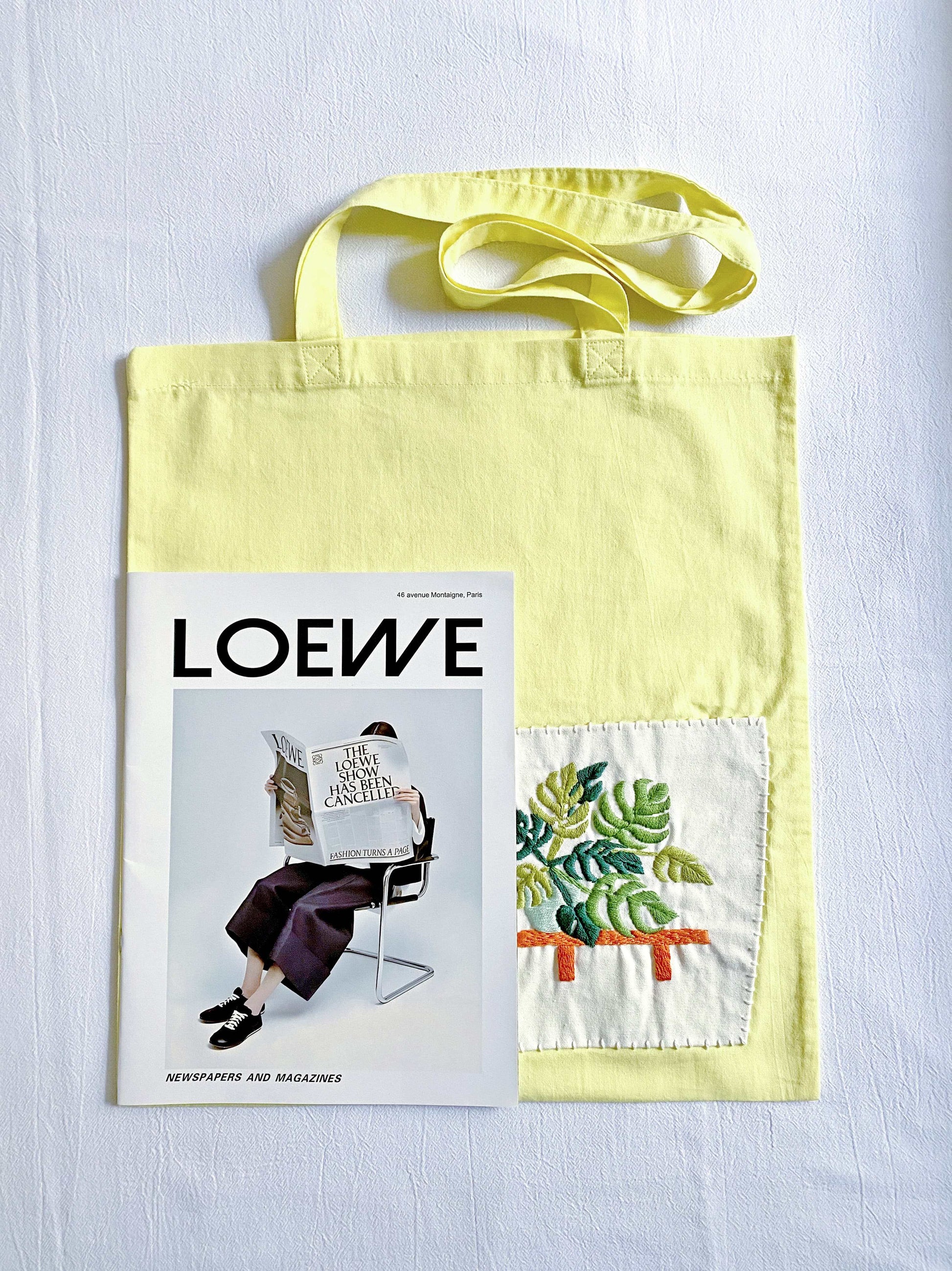 Yellow cotton tote with soft texture and botanical embroidery, a casual gift for holidays or special occasions