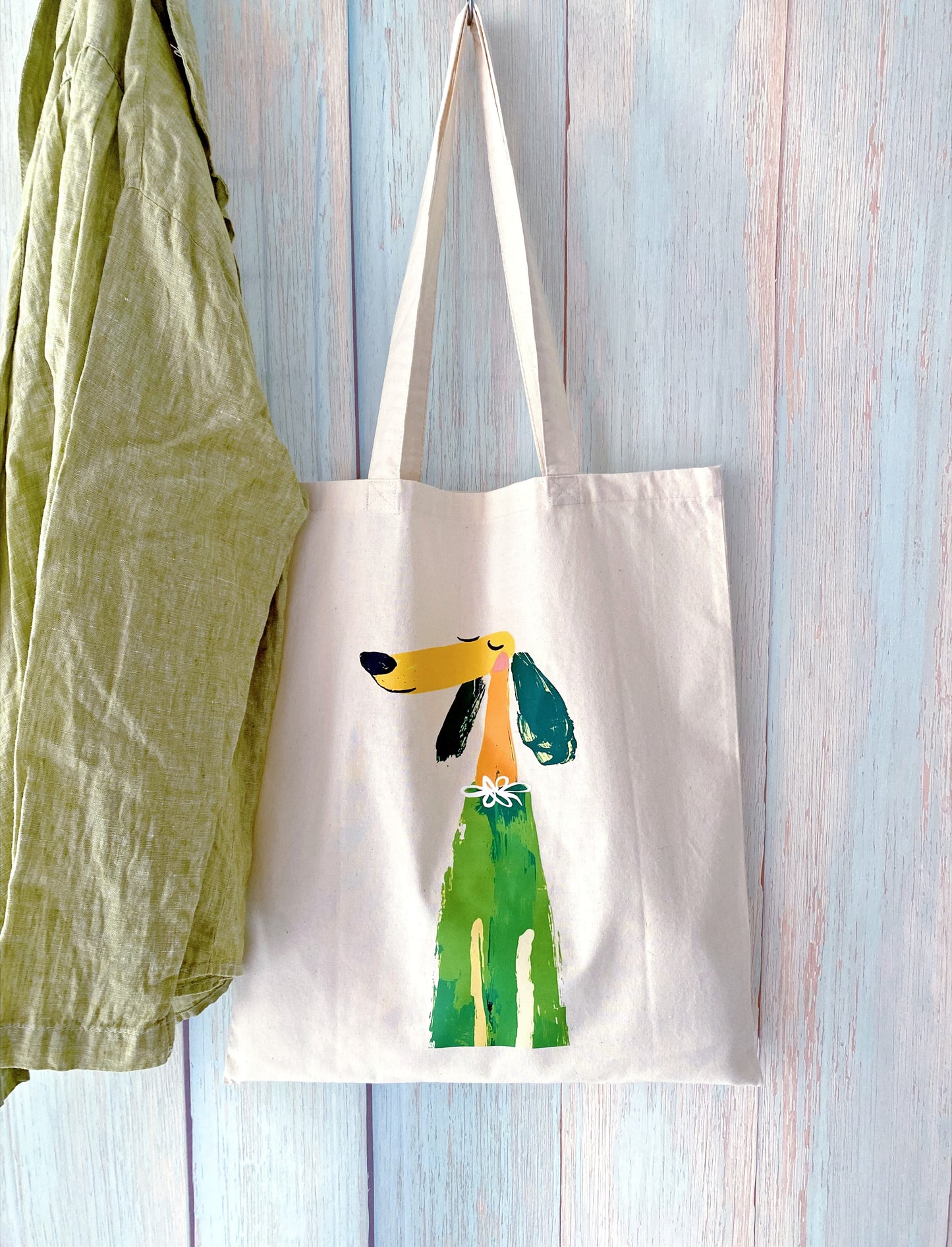 Thoughtful puppy themed cotton tote wrapped as a meaningful birthday gift for a dog lover