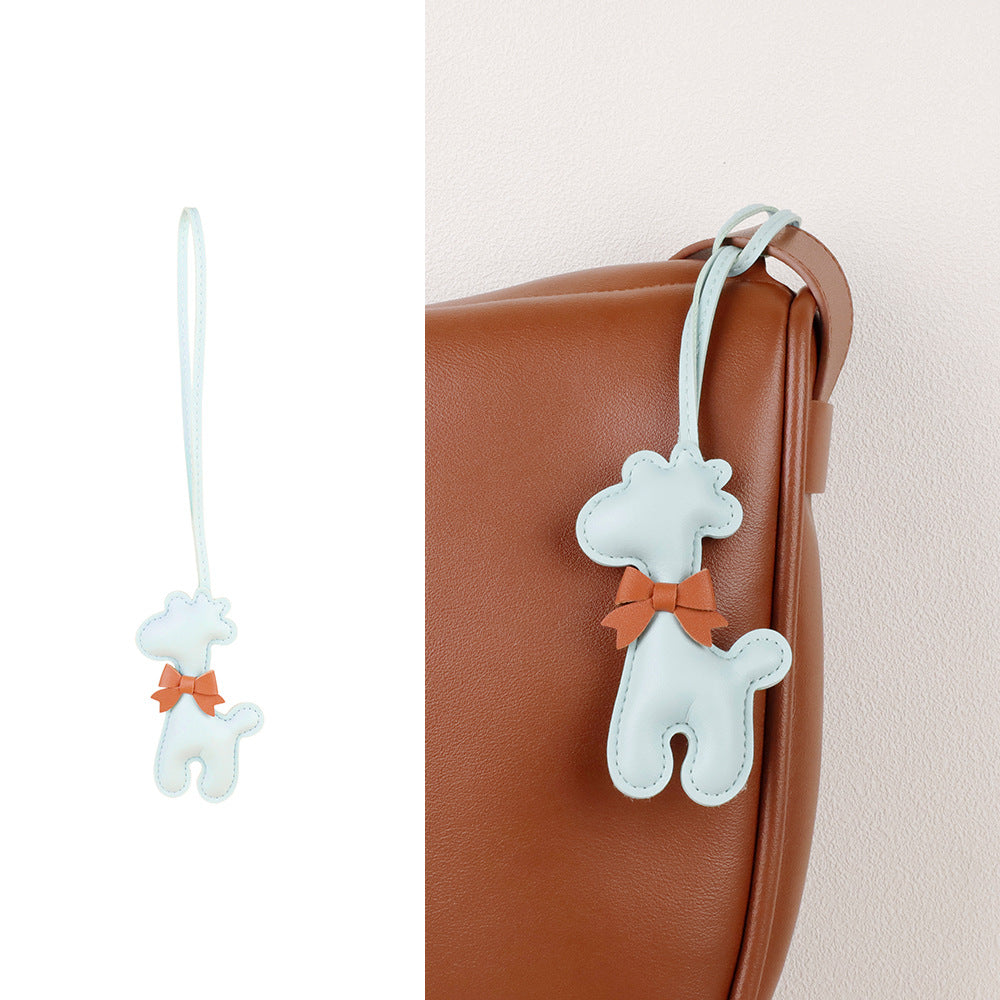 A colorful scarf accent refreshing a familiar handbag