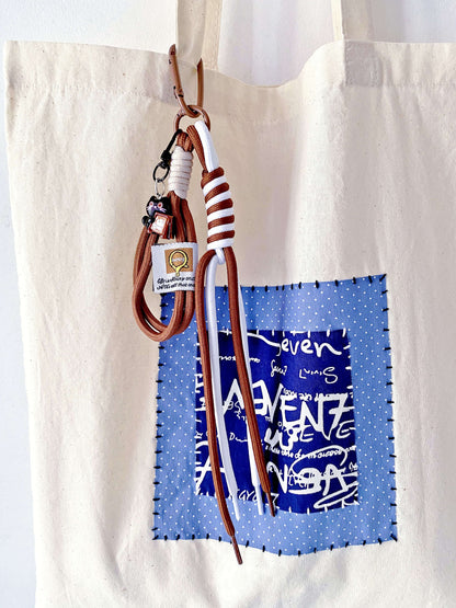 roomy tote bag holding books and small daily items