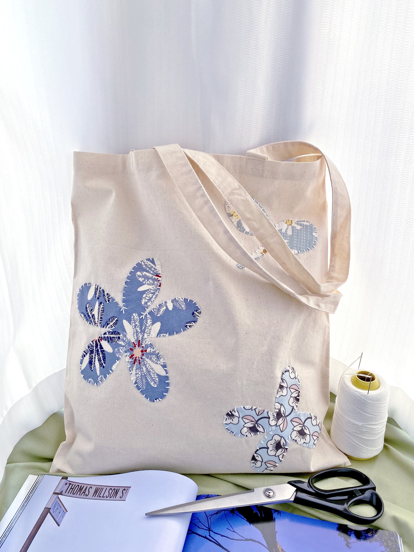 Modern heirloom quality tote with intricate hand-finished details for everyday use.