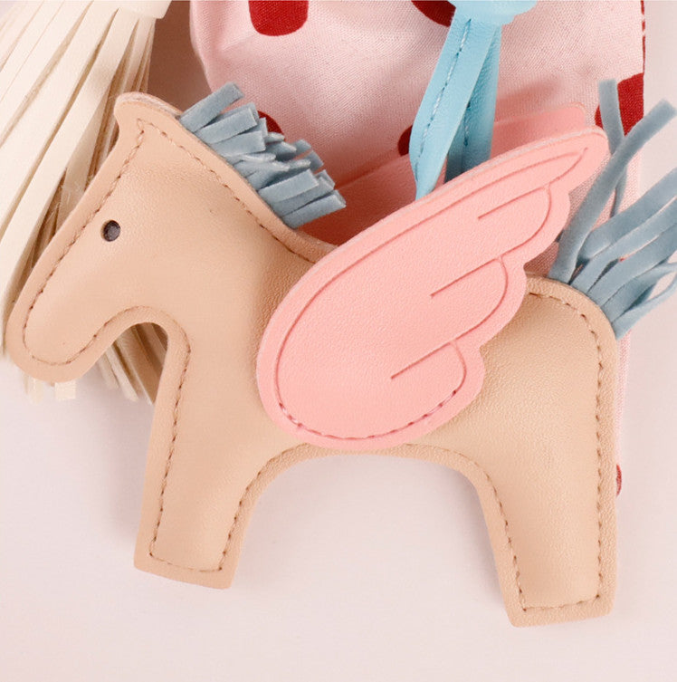Pink scarf bow keychain with dangling tassel details