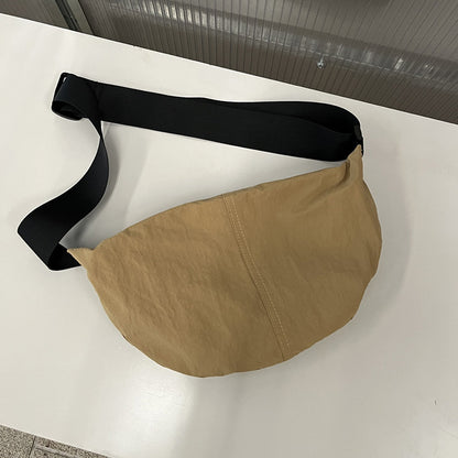 Compact crossbody bag for travel essentials