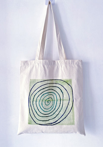 Using a high-capacity hand-painted bag to carry fresh sourdough and flowers from the market.