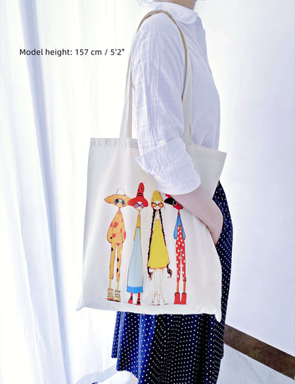 Lightweight foldable travel bag featuring hand-printed inclusive sisterhood design