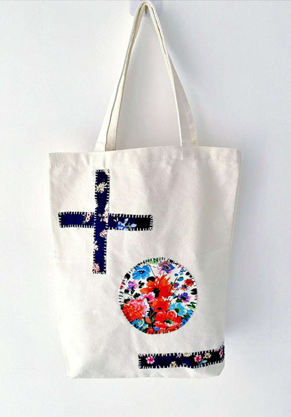 Casual canvas tote displayed with stitched fabric panels