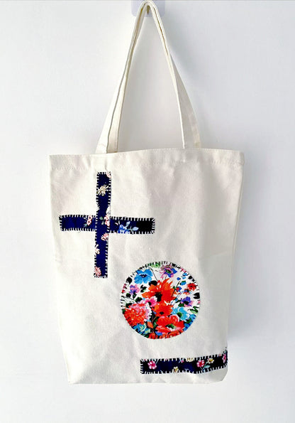 Casual canvas tote displayed with stitched fabric panels