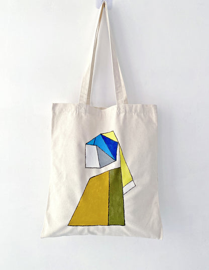 Why this hand-painted artistic tote is a better alternative to mass-produced plastic bags.