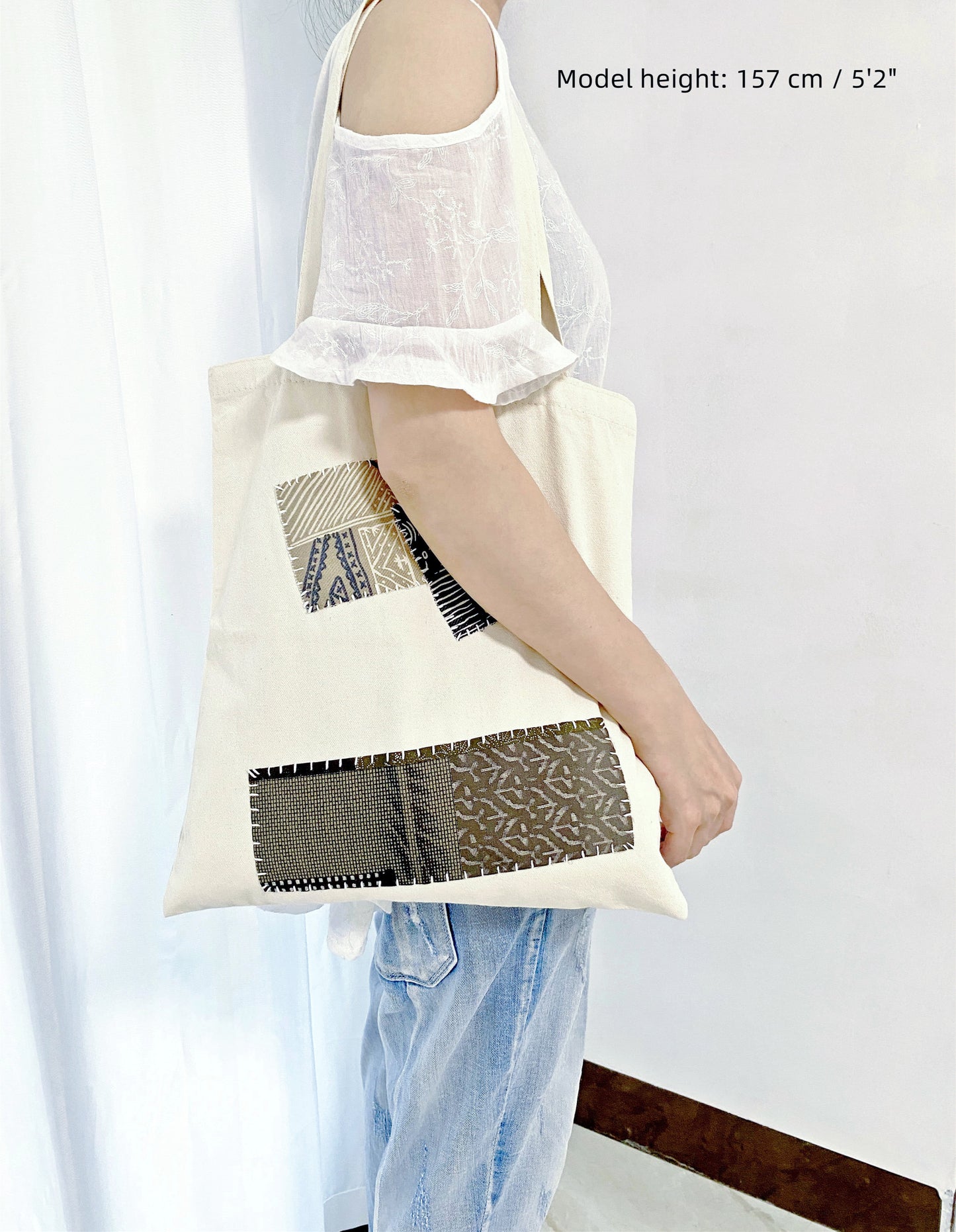 Minimalist boho-chic style bag paired with vintage denim and linen.
