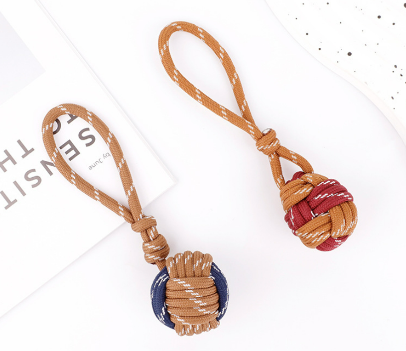 Woven cord keychain charm with playful color contrast