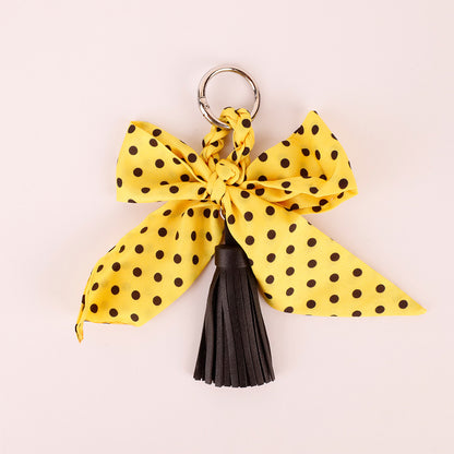 Bow and tassel accessory for gifting