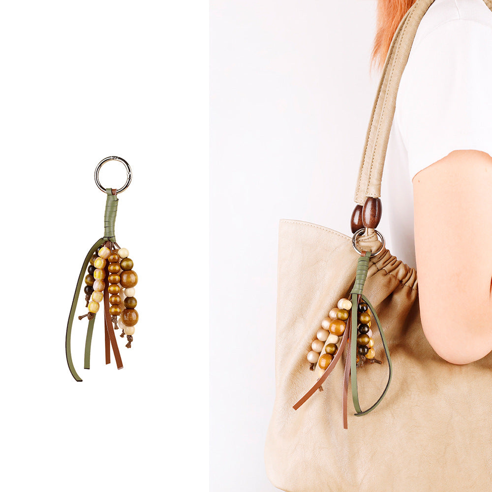 Small giftable bag charm with natural materials