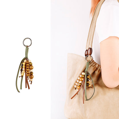 Small giftable bag charm with natural materials