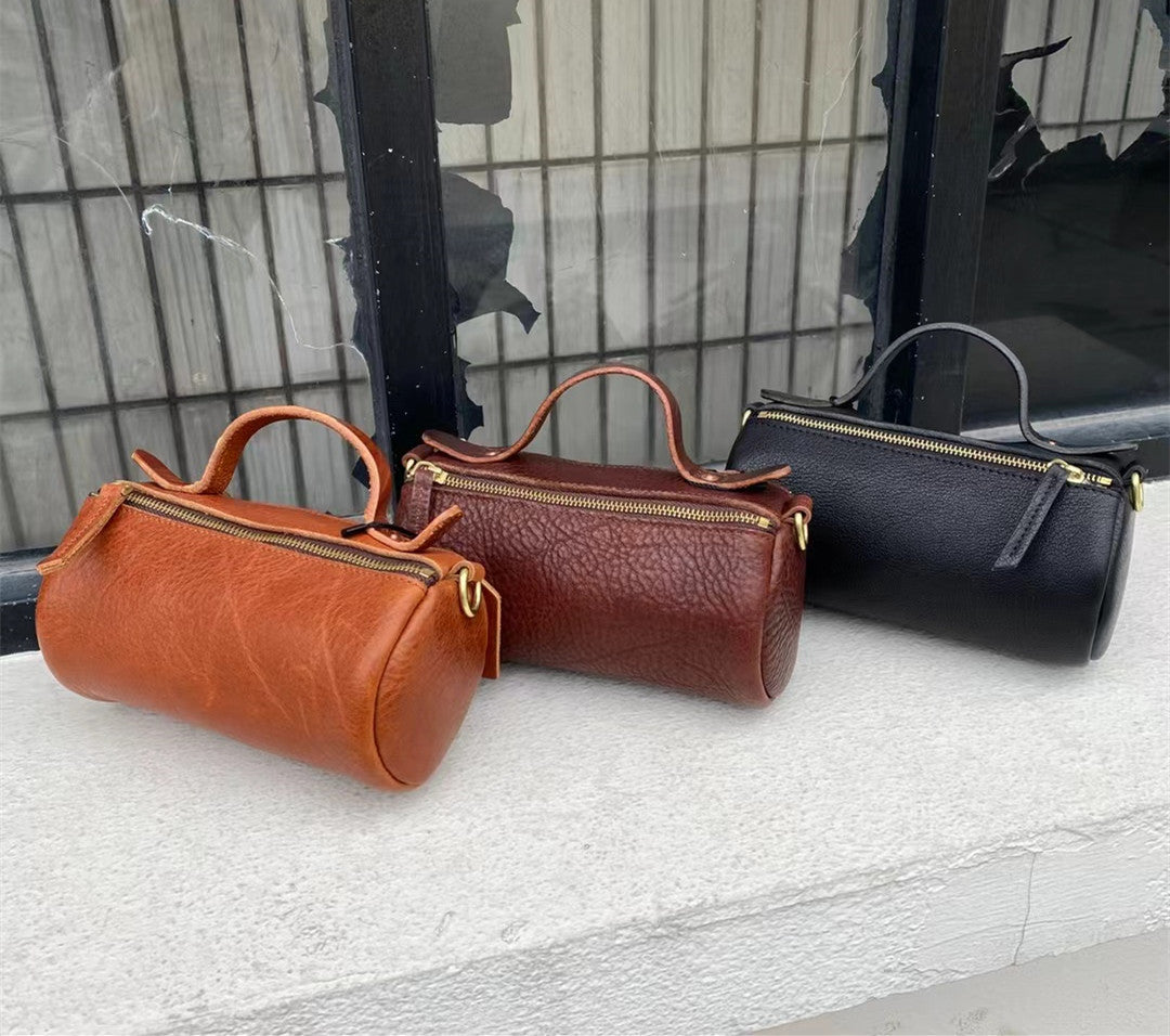 Chic Cylinder Shaped Leather Handbag with Adjustable Sling