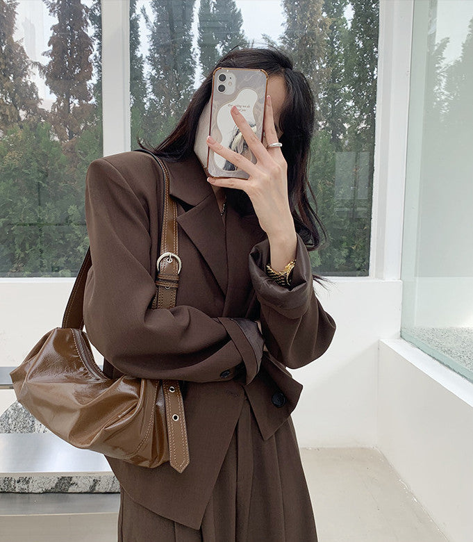 Compact crossbody for keeping small items organized