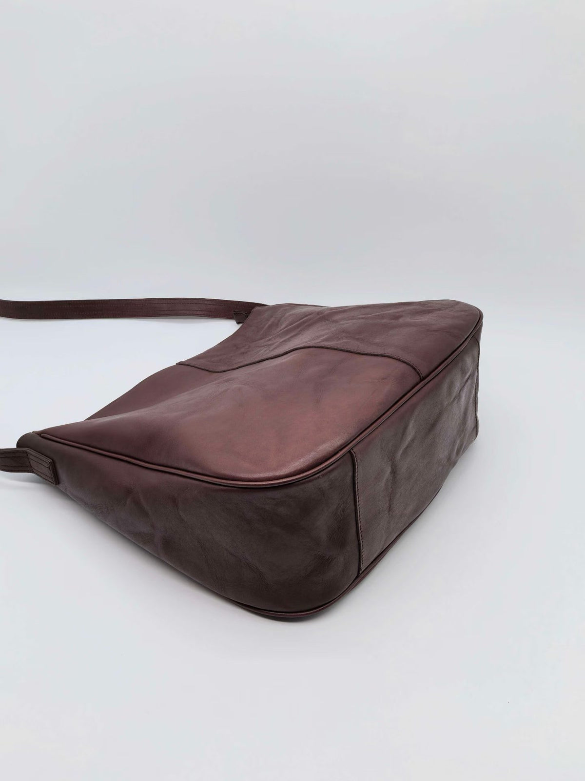 Classic shoulder bag paired with travel clothes for a weekend city break